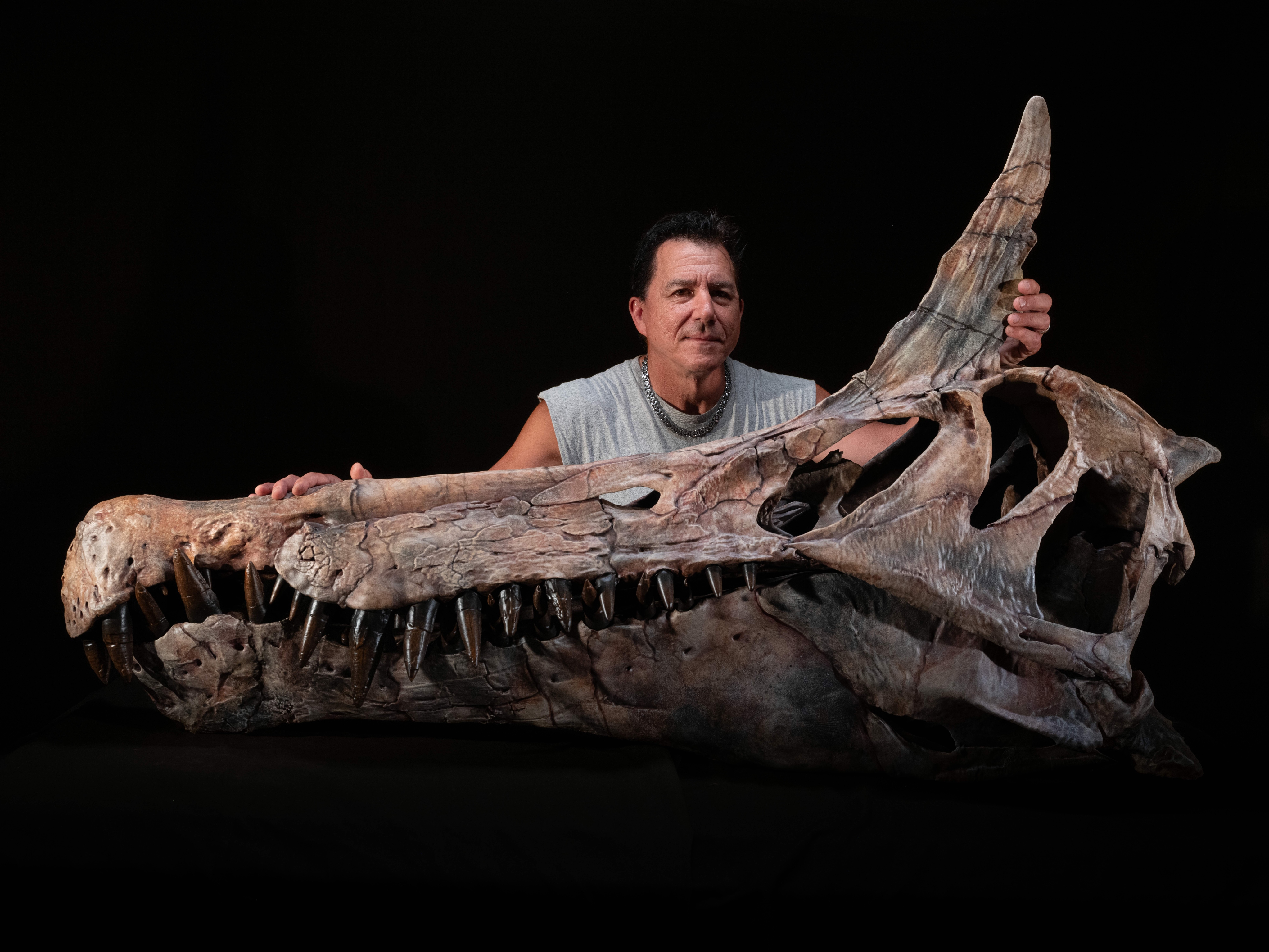 Professor Paul Serano with a physical reconstruction of what is definitely not a dragon.